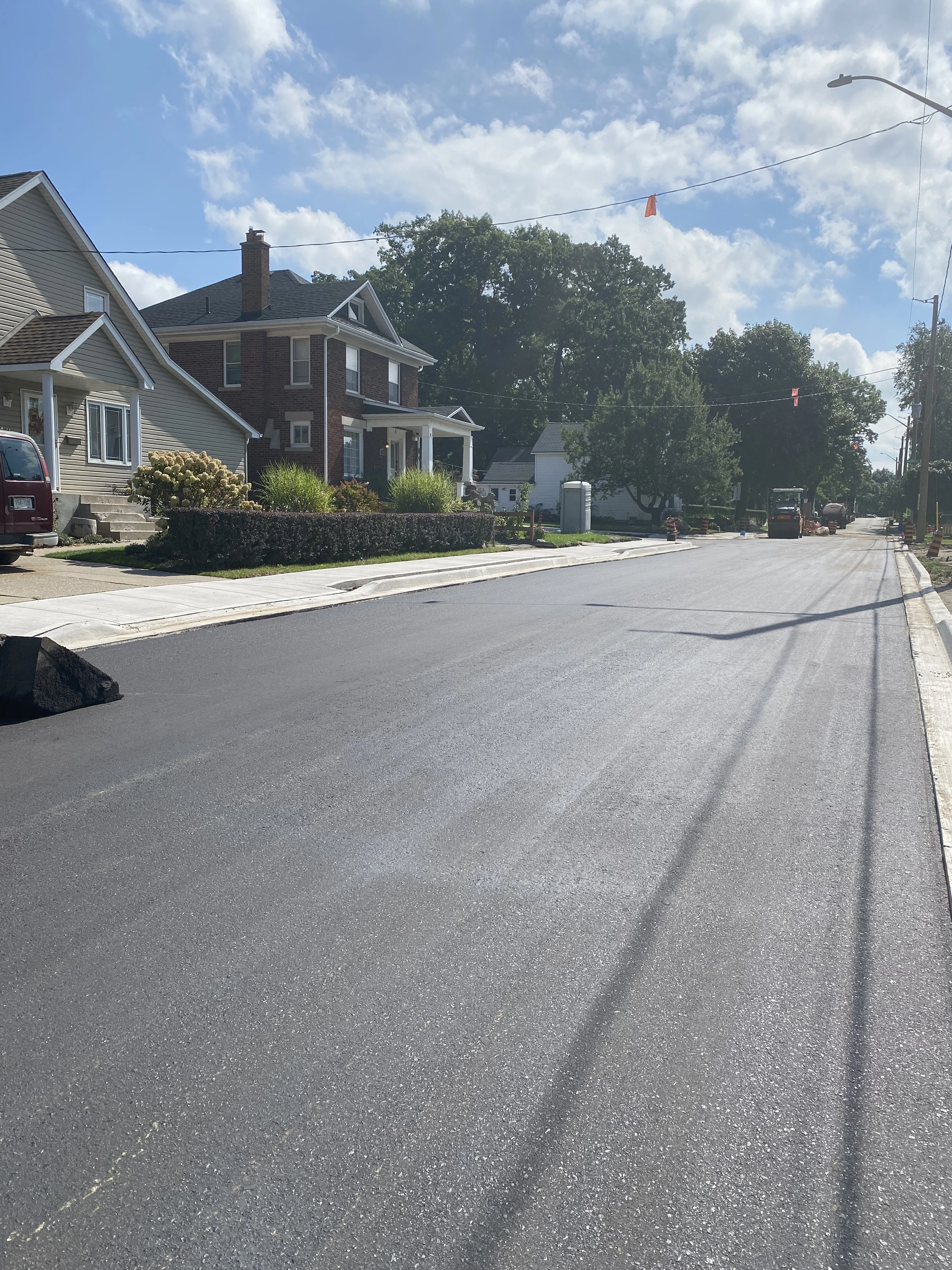 Centre St and Short St (Construction) - Completed road with new asphalt, sidewalks, and curbs